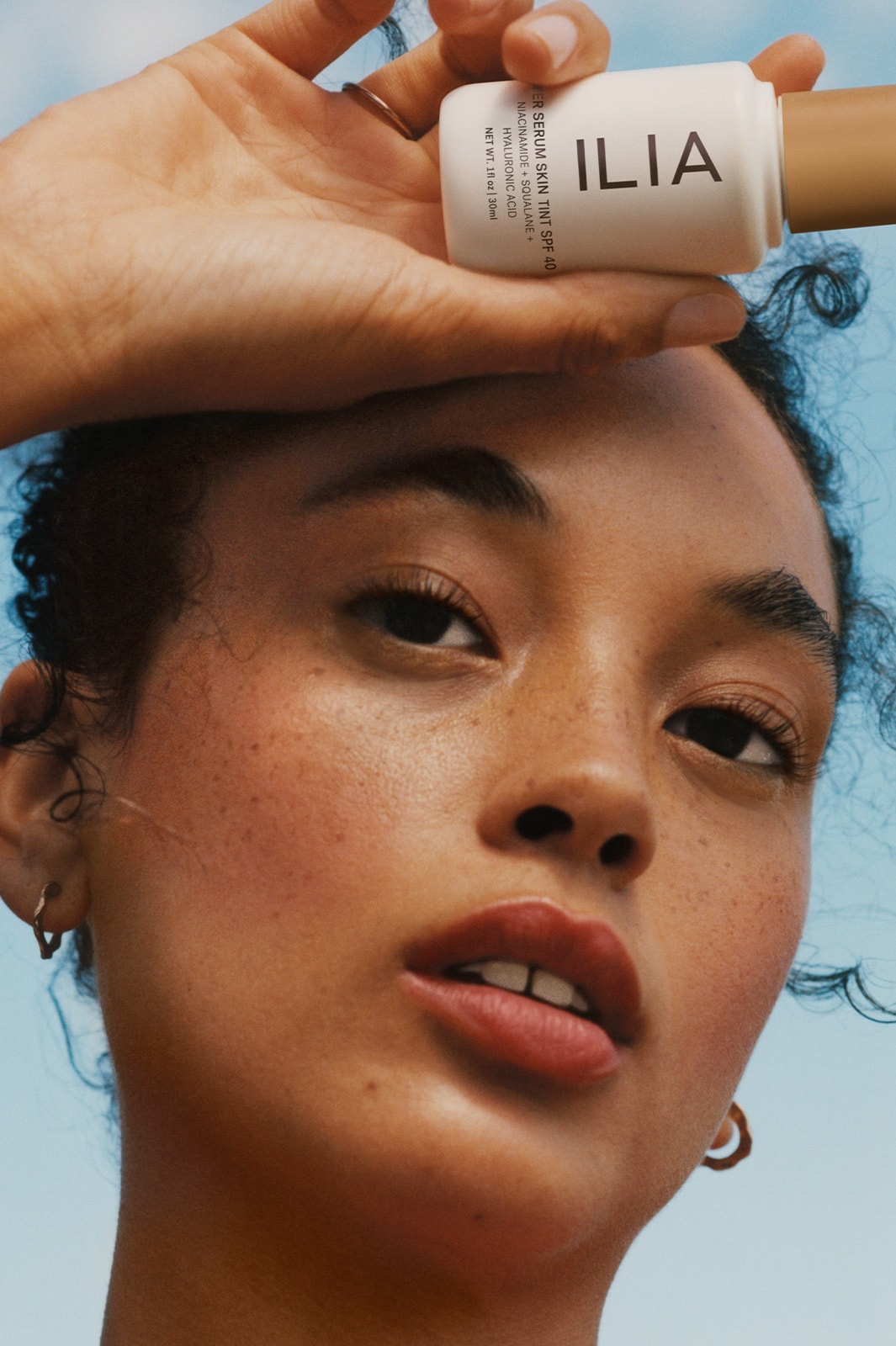 founder of ilia sasha plavsic posing, clean beauty, skincare, makeup 