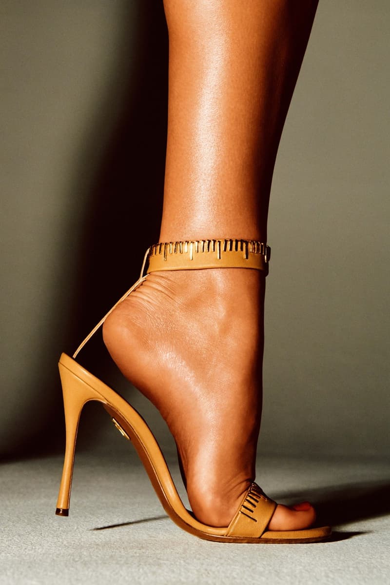 schiaparelli woman naked body slouchy leather bag yellow brown