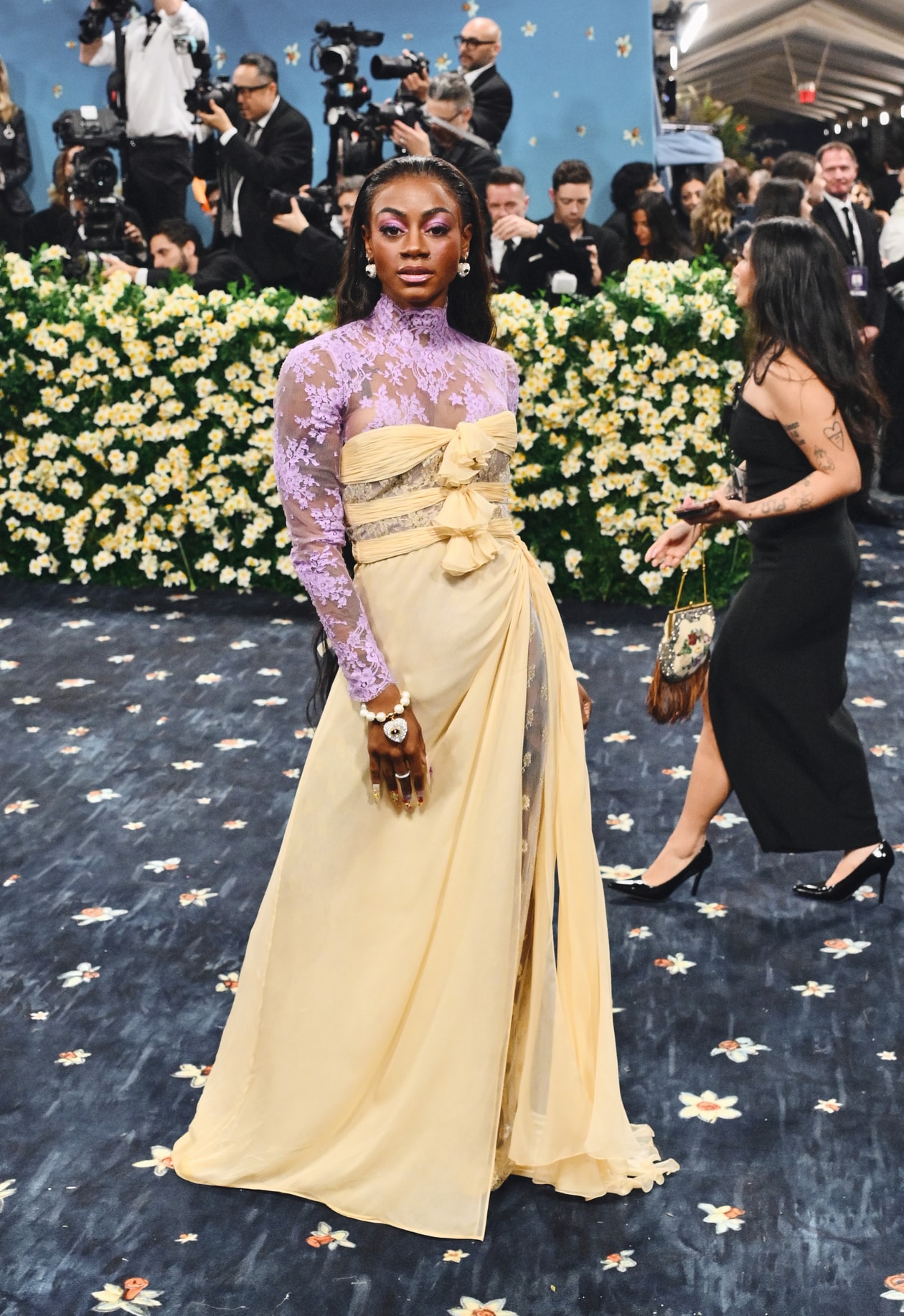 emma chamberlain met gala red carpet tailoring blonde woman body 