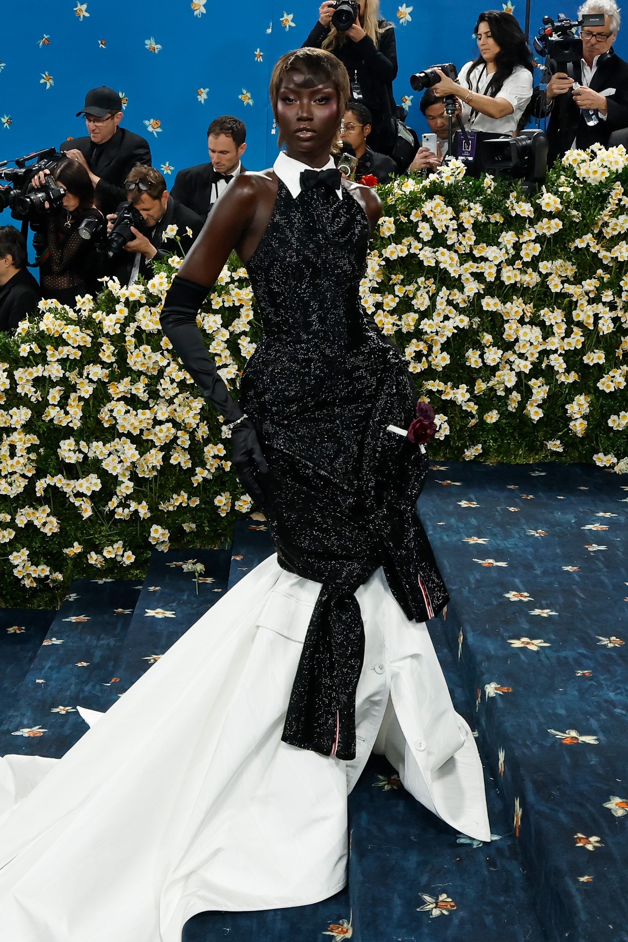 emma chamberlain met gala red carpet tailoring blonde woman body 