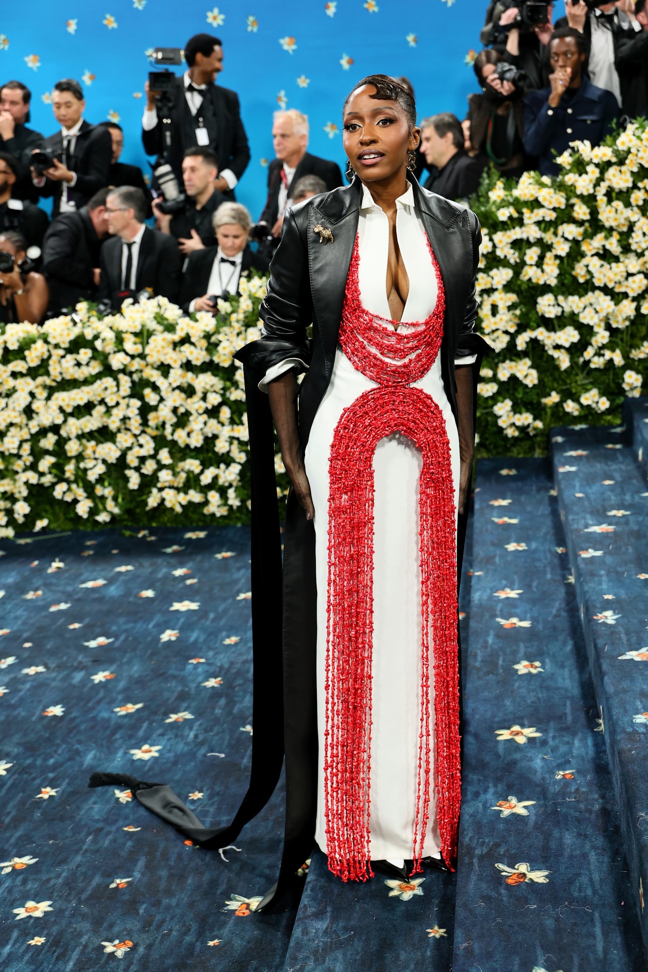 emma chamberlain met gala red carpet tailoring blonde woman body 