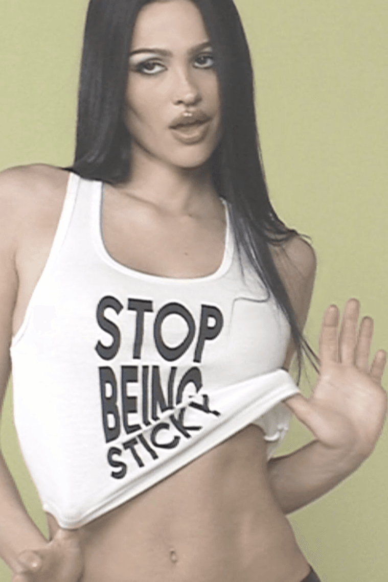 amelia gray posing in a tank top, new mac cosmetics lipglass campaign, lisa rinna, zaya wade, francesca scorcese, makeup, beauty