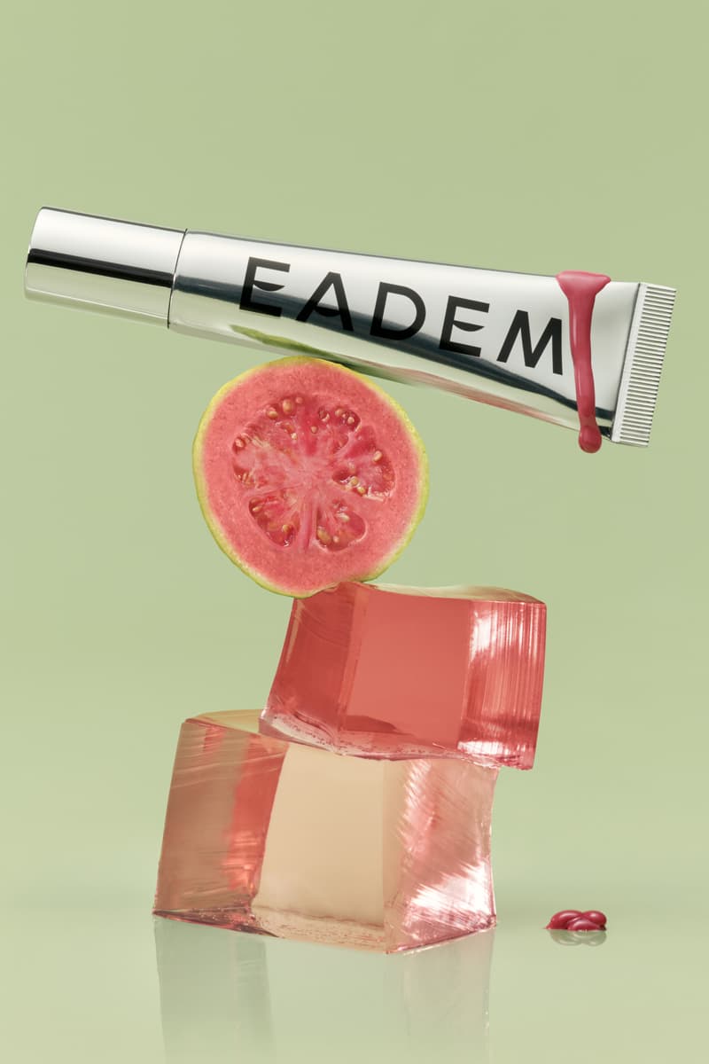 woman licking lollipop, eadem chou chou lip balm in guava fresca skincare makeup beauty
