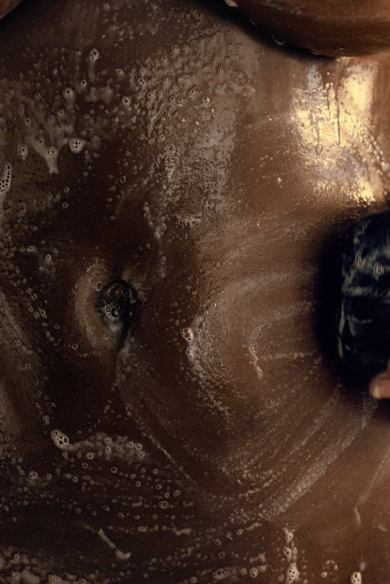 julia fox posing with mienne products on white bed, luxury skincare brand