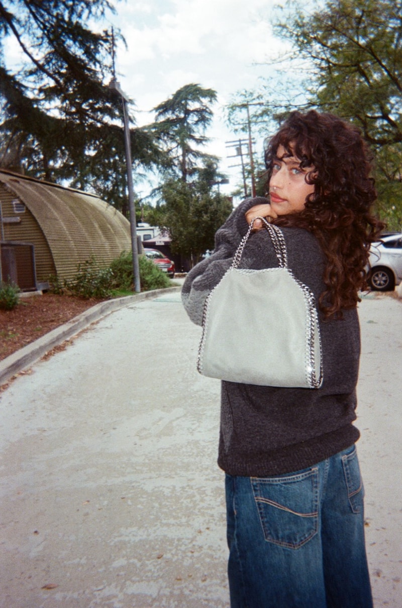 odessa a'zion actor stella mccartney falabella bag camera disposable naked 