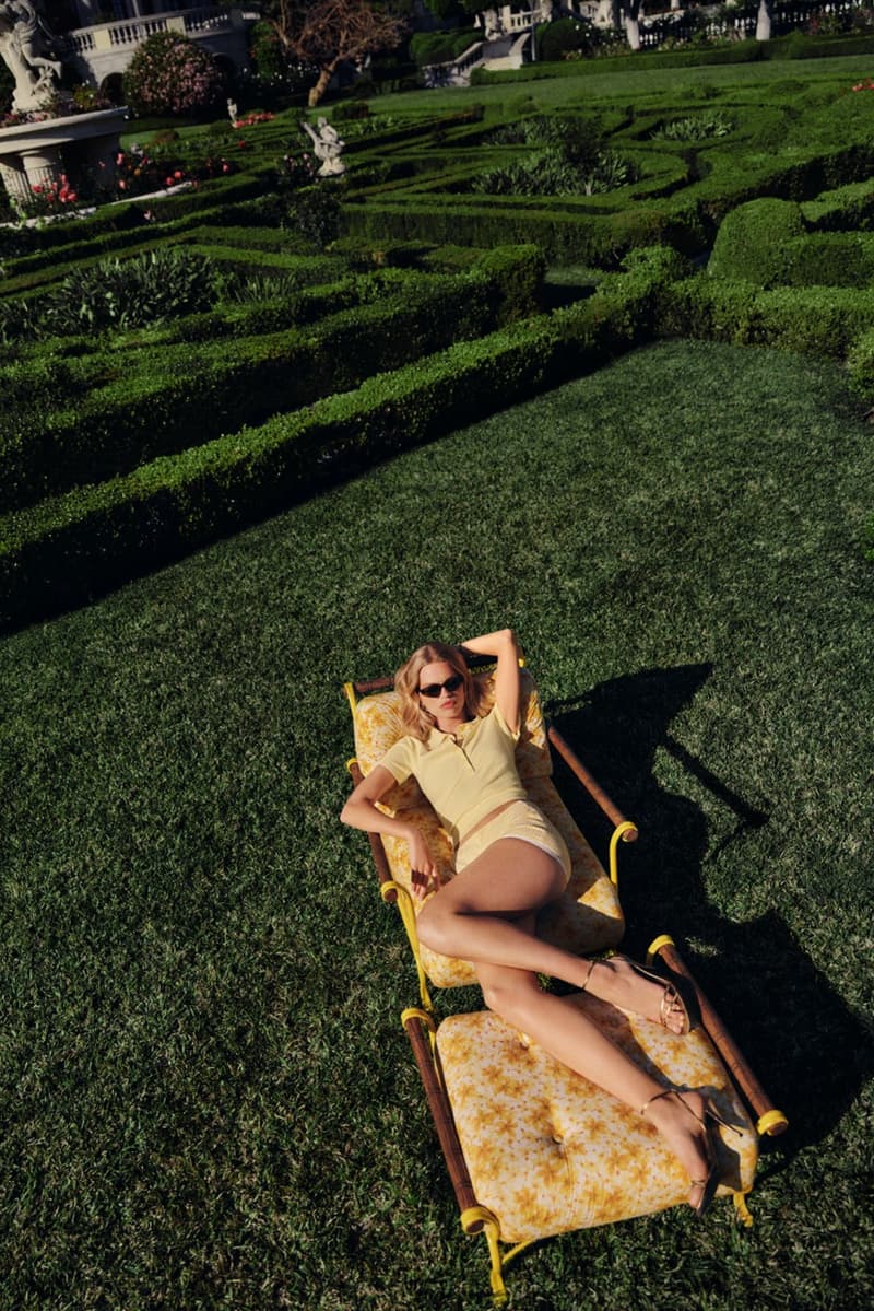reformation jimmy fairly sunglasses girl laying down butter yellow polo shirt grass sofa 