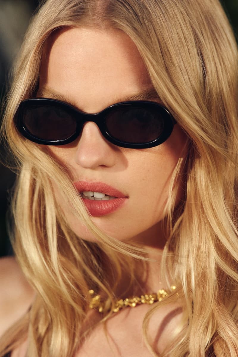 reformation jimmy fairly sunglasses girl laying down butter yellow polo shirt grass sofa 