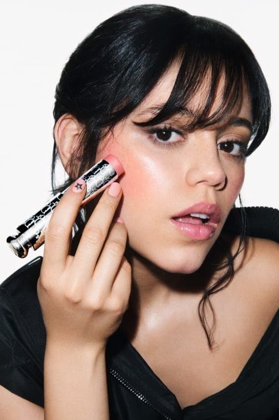 jenna ortega posing with dior makeup, dior beauty, peter philips, beauty