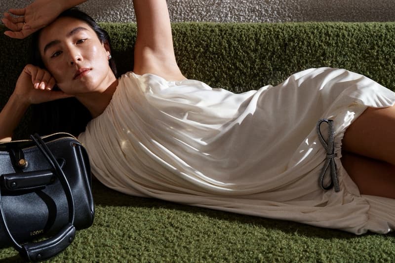loewe greta lee draped dress puzzle bag woman lying down actor