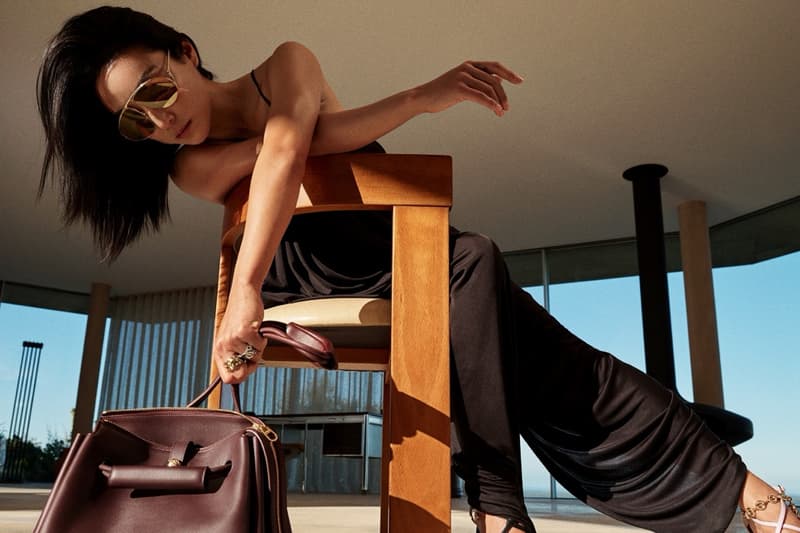 loewe greta lee draped dress puzzle bag woman lying down actor