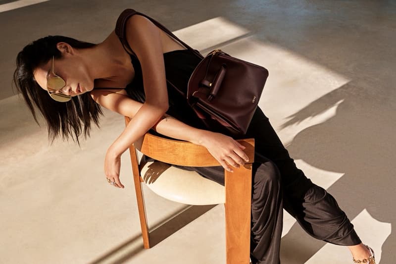 loewe greta lee draped dress puzzle bag woman lying down actor