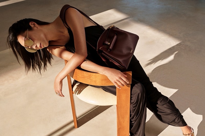 loewe greta lee draped dress puzzle bag woman lying down actor