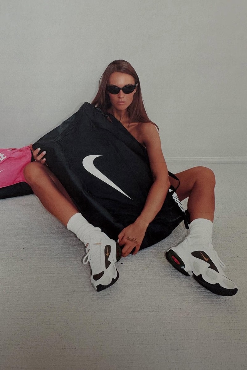 veneda carter nike white sneakers swoosh bags woman girl legs 