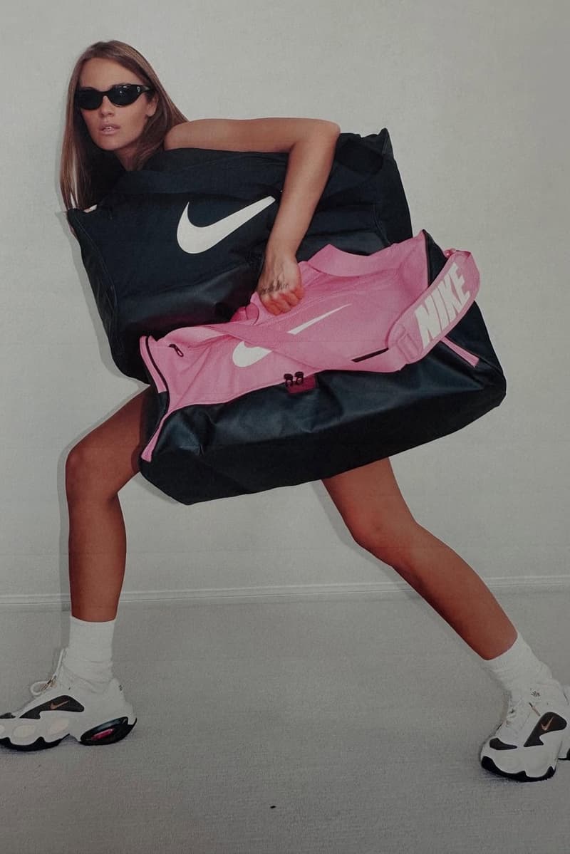 veneda carter nike white sneakers swoosh bags woman girl legs 