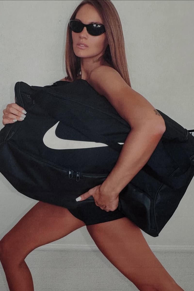 veneda carter nike white sneakers swoosh bags woman girl legs 