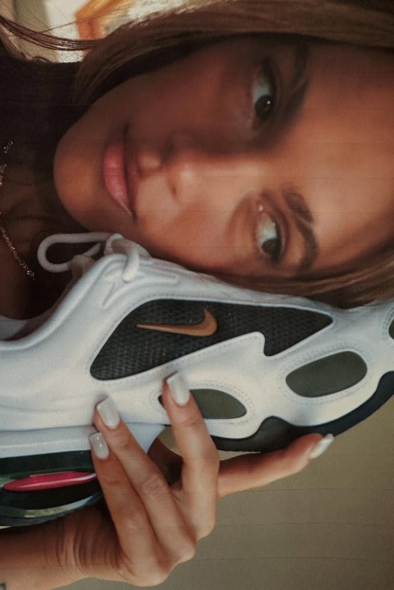 veneda carter nike white sneakers swoosh bags woman girl legs 