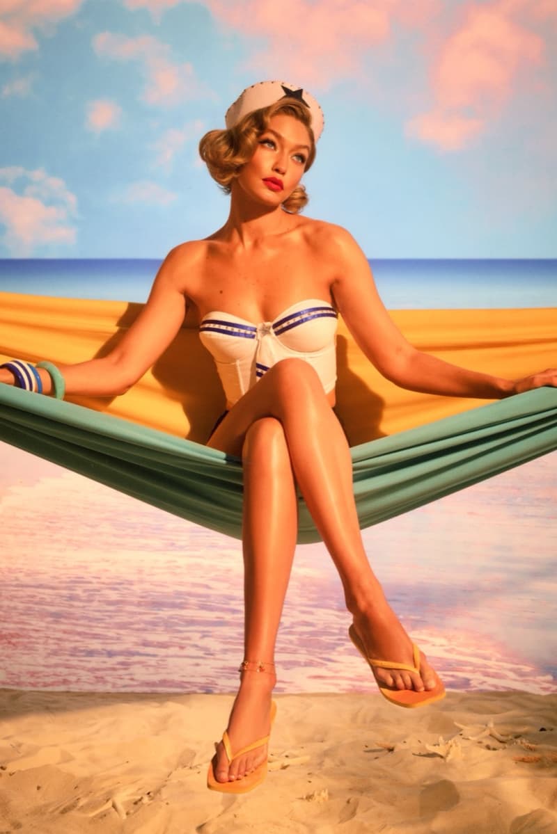 gigi hadid, havaianas, sailor hat, woman, flip flops, pants, beach, hammock