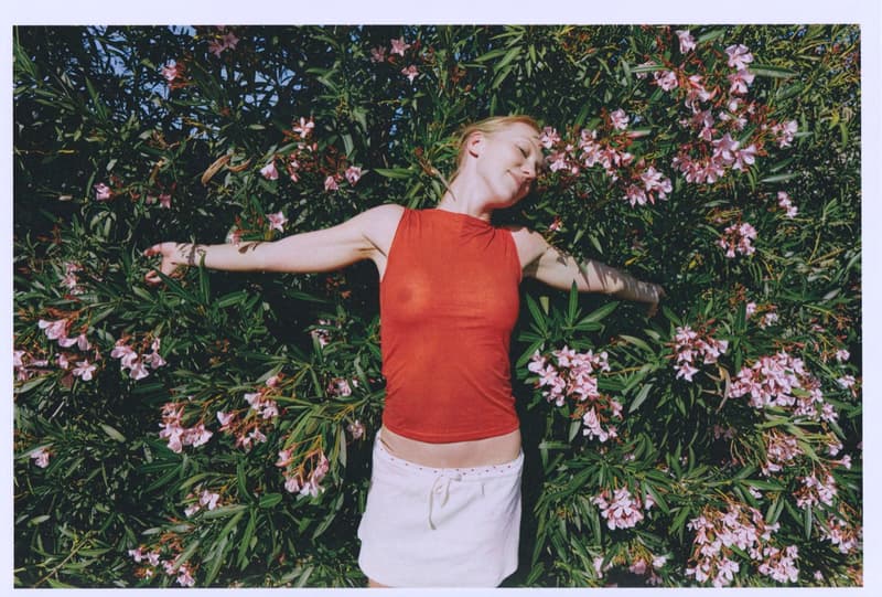 fruity booty, swimwear, bikinis, fish prints, sea, woman, girl, lying down, on the beach