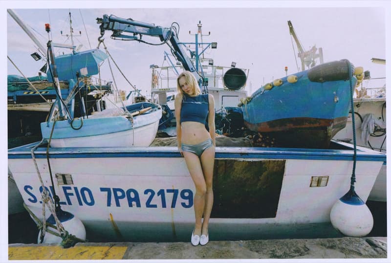 fruity booty, swimwear, bikinis, fish prints, sea, woman, girl, lying down, on the beach