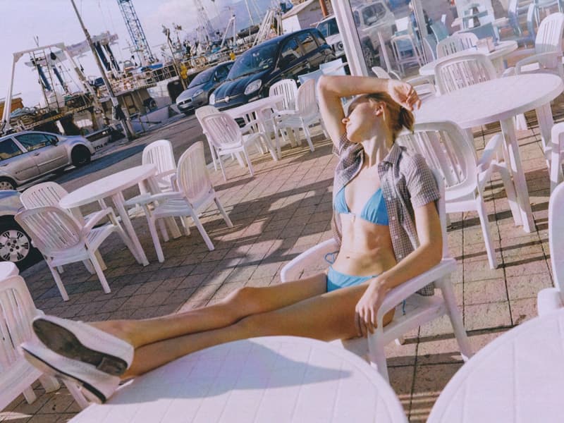 fruity booty, swimwear, bikinis, fish prints, sea, woman, girl, lying down, on the beach