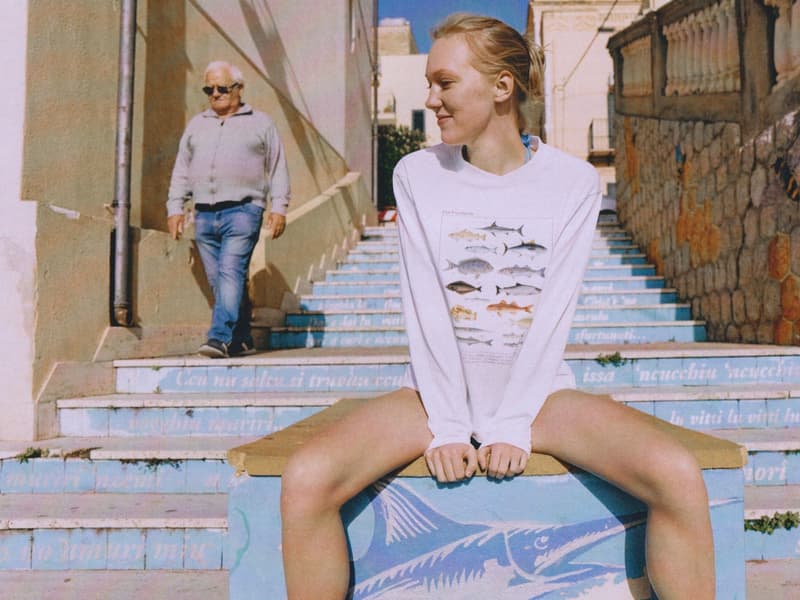 fruity booty, swimwear, bikinis, fish prints, sea, woman, girl, lying down, on the beach