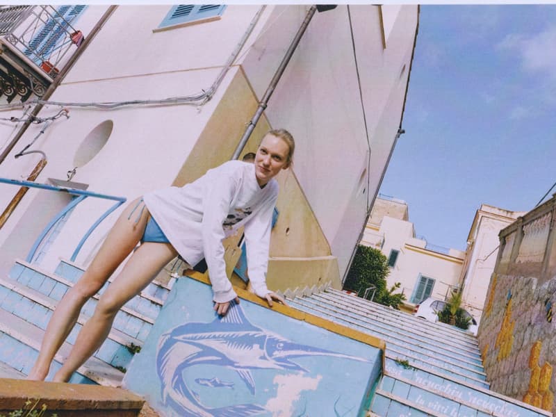 fruity booty, swimwear, bikinis, fish prints, sea, woman, girl, lying down, on the beach