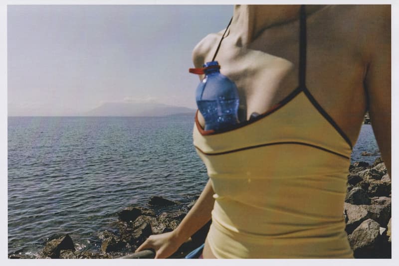 fruity booty, swimwear, bikinis, fish prints, sea, woman, girl, lying down, on the beach