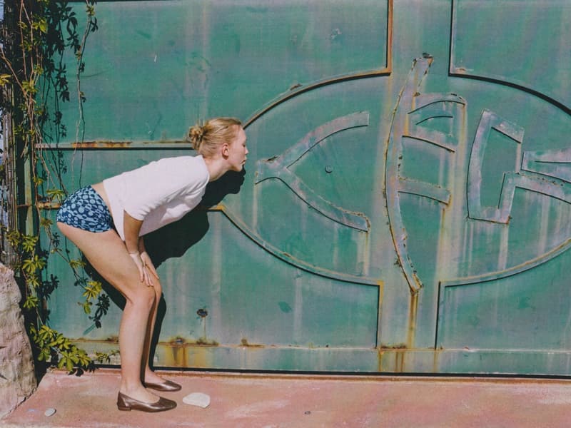 fruity booty, swimwear, bikinis, fish prints, sea, woman, girl, lying down, on the beach