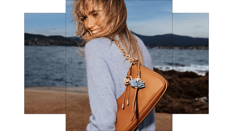 michael kors spring summer 2026 ss26 season south of france inspired french riviera cote d'azur ready to wear and accessories handbags laila satchel beach bags hamilton nolita josie crotchet suede artisanal woven leather straw
