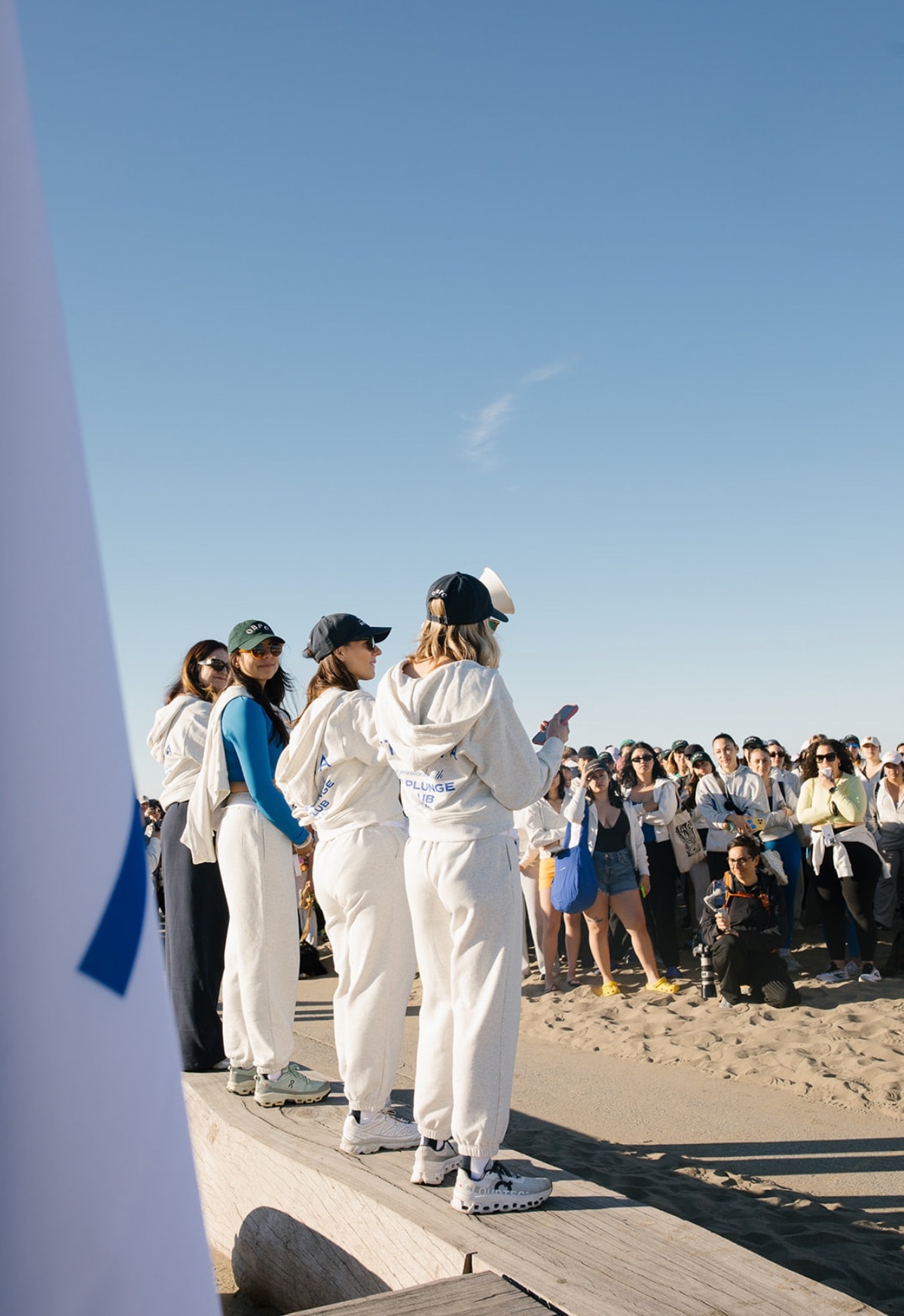 athleta international women's day women's history month bay area san francisco cold plunge ocean plunge walk wellness fitness female-first brands initiatives