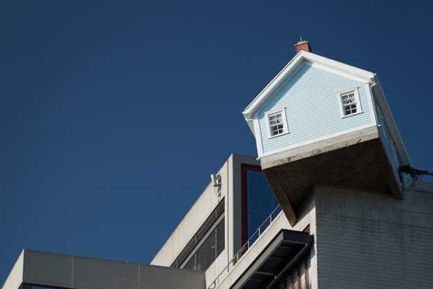 The Do Ho Suh “Fallen Star” Sculpture Is A House On the Edge