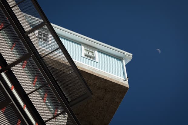 The Do Ho Suh “Fallen Star” Sculpture Is A House On the Edge
