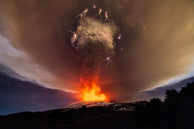 Sicily as Mount Etna's Voragine crater erupts