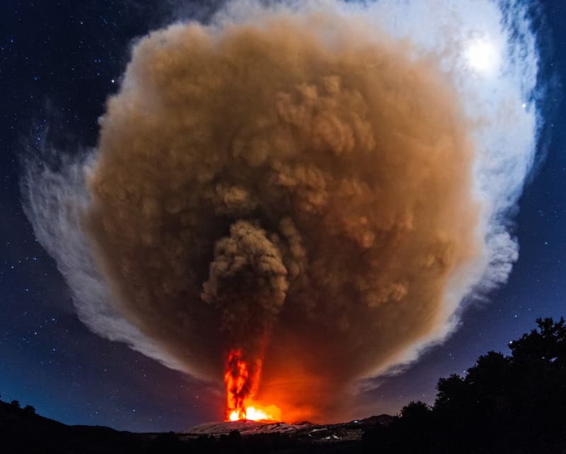Sicily as Mount Etna's Voragine crater erupts