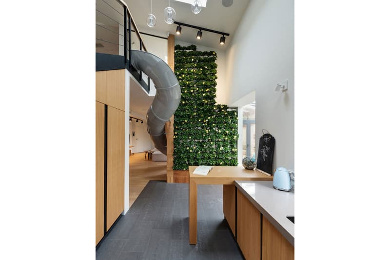 ki design studio was designed an apartment with slide