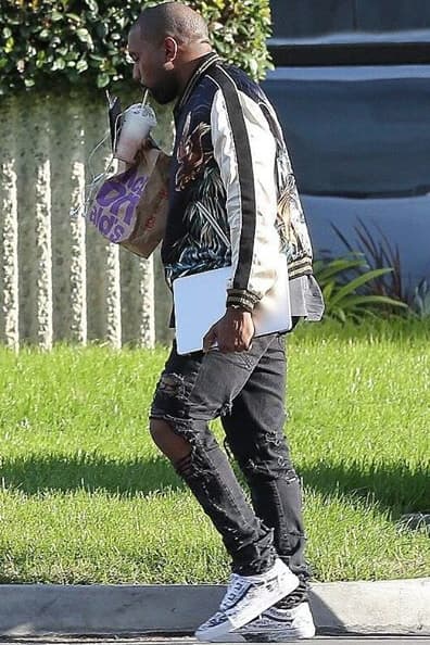 Kanye West Wearing A Custom Pair Of Vans