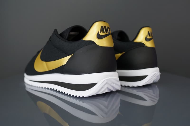 nike cortez ultra black gold