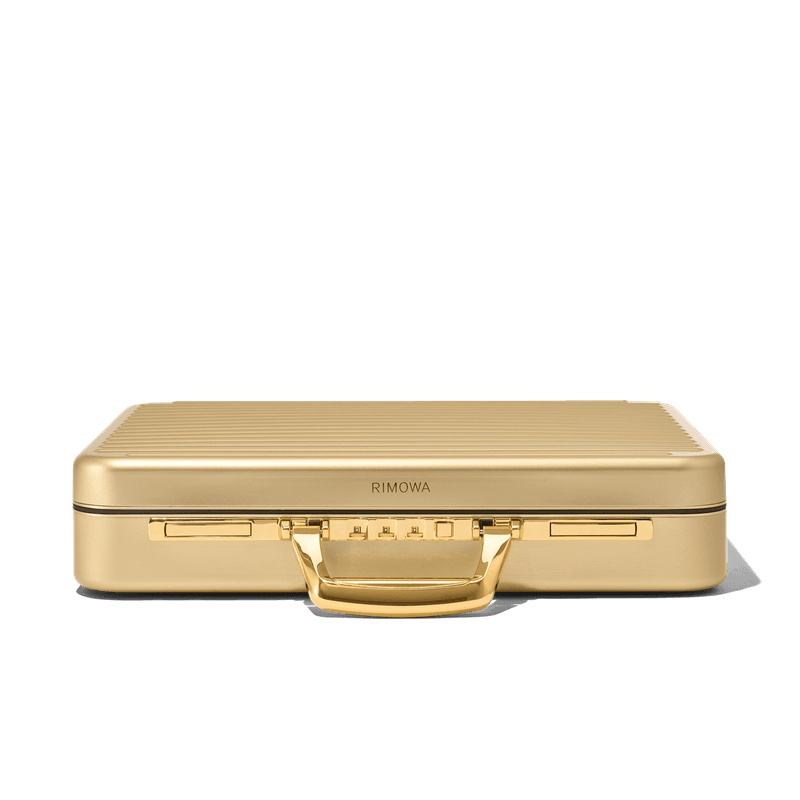 RIMOWA 推出全新 Attaché Gold 限量手提公事包