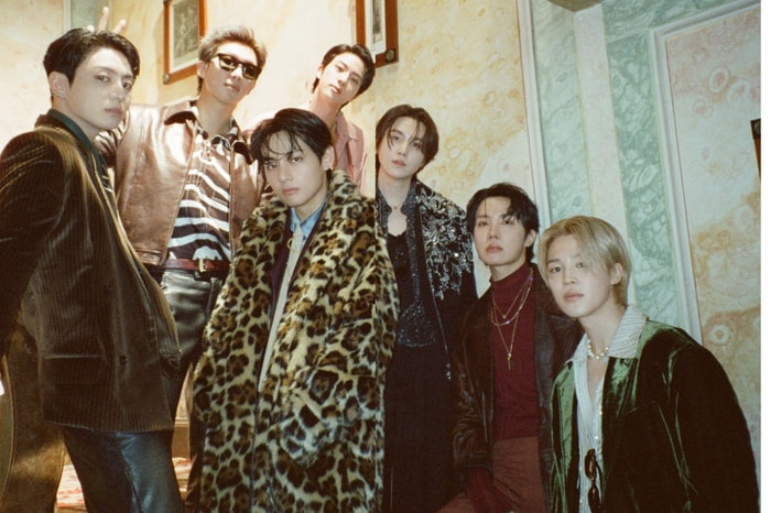 From leopard print coats to velvet suits, BTS wears two seasons of AMIRI menswear in “NORMAL”