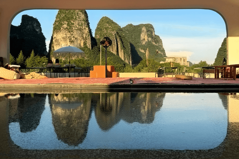 You don’t have to do anything, just sit and look at the mountains! At Yangshuo’s Tianqingse, coffee time turns into a natural meditation