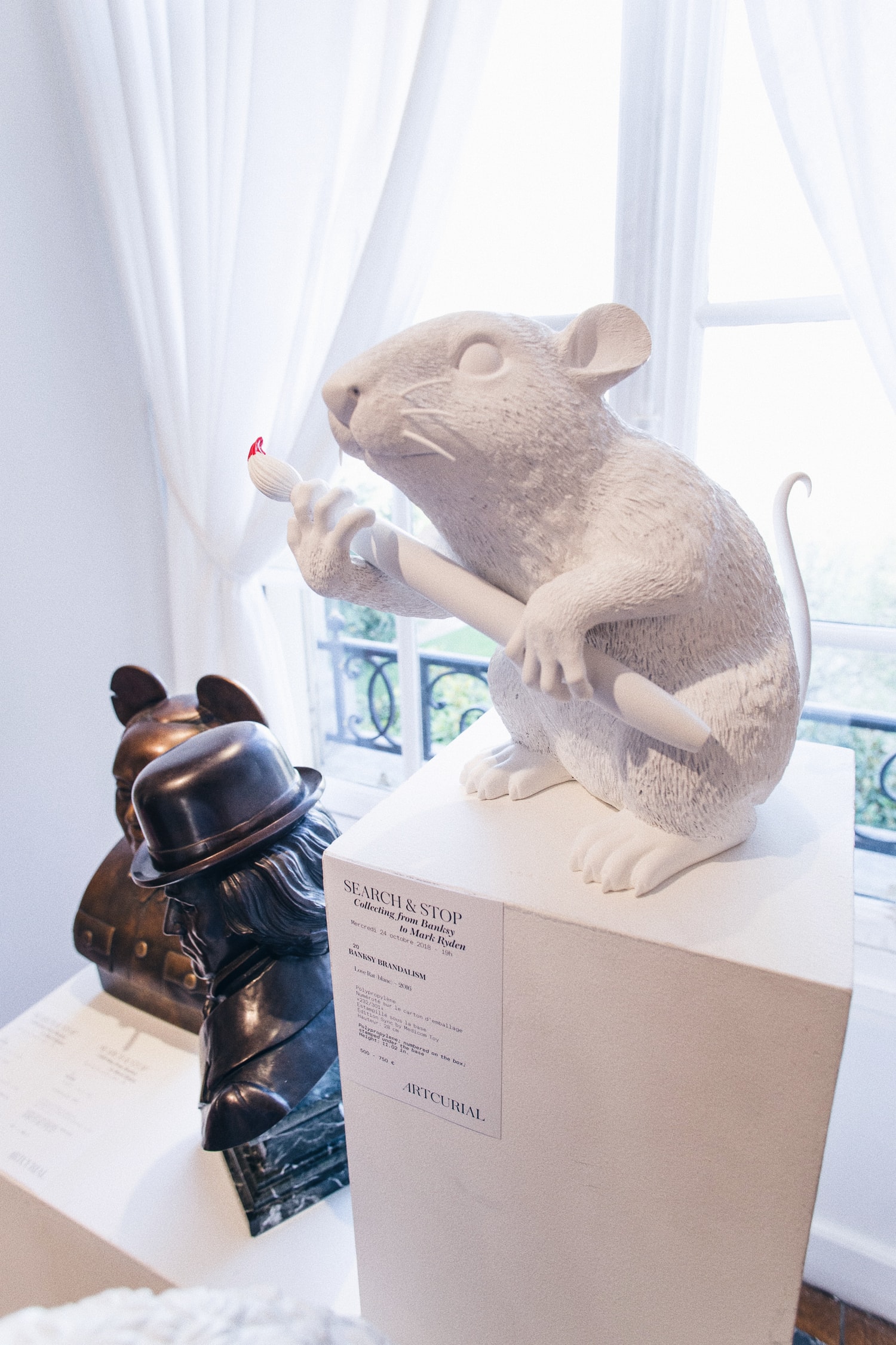 Banksy, vente aux enchères, KAWS