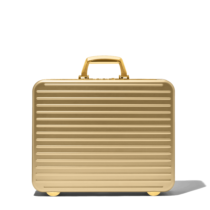 RIMOWA sort son attaché Gold à 1 400€