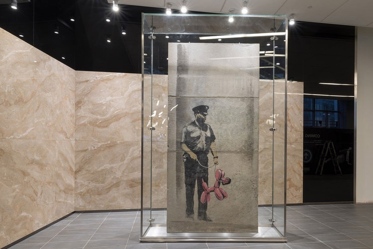 Banksy 經典畫作《Guard with Balloon Dog》修復過程幕後花絮