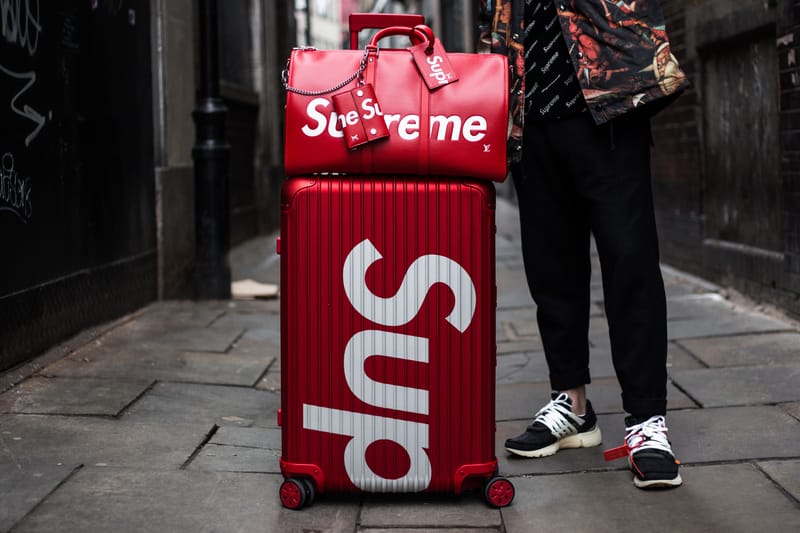 supreme rimowa topas multiwheel 82l red