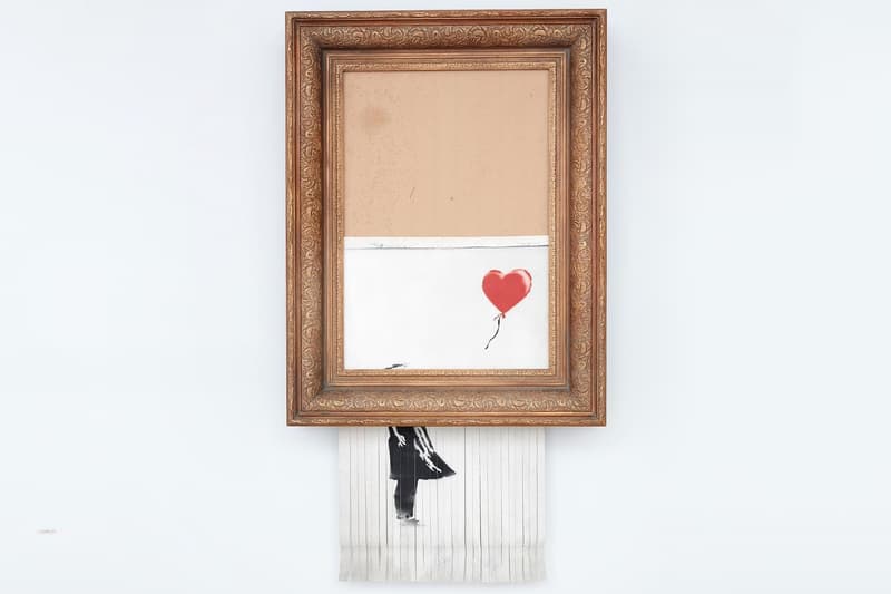 Banksy 經典《Girl With a Balloon》自毀後正式更名並成功售出