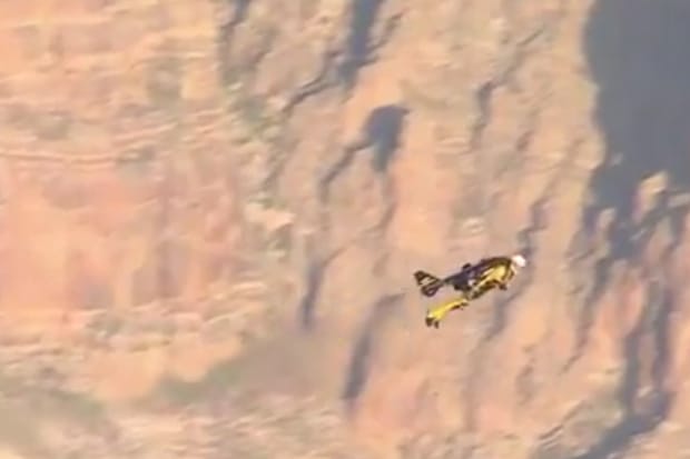 Swiss "Jetman" Yves Rossy Flies Over Grand Canyon