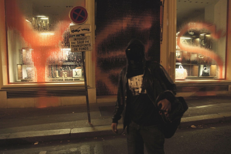 A guest is seen on the street attending LOUIS VUITTON during Paris