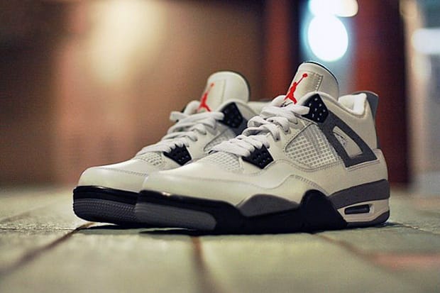 jordan 4 white cement on foot