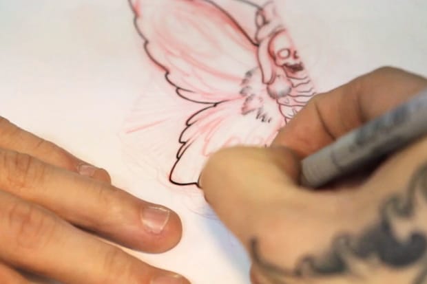 Desillusion: Hand and Glove Tattoo Studio