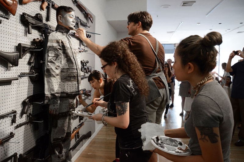 Liu Bolin's Gun Rack Performance @ Eli Klein Fine Art Gallery New York